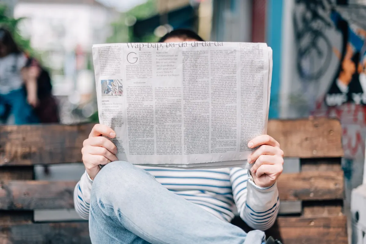 Stack of newspapers representing media coverage and journalism failures
