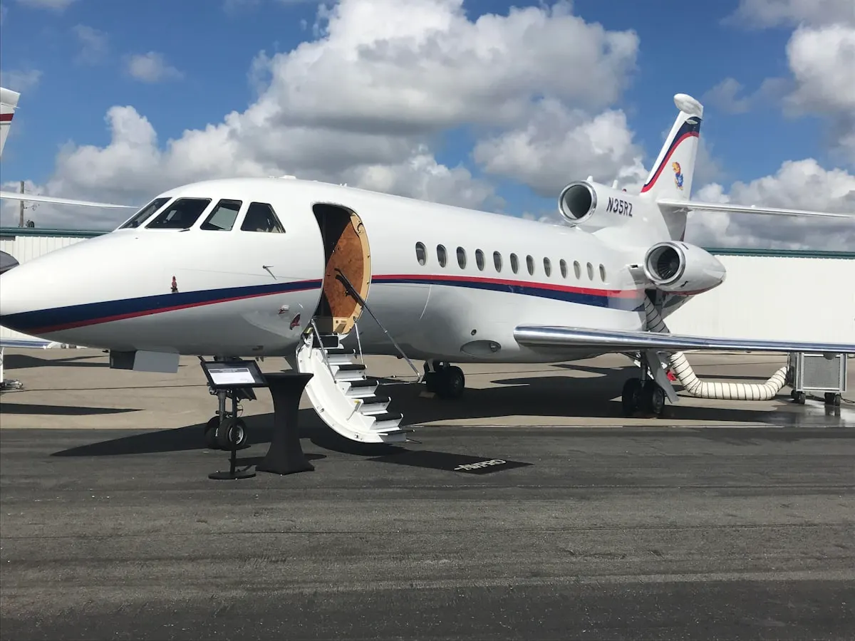 Aerial view of a private jet in flight representing Epstein flight logs and travel records