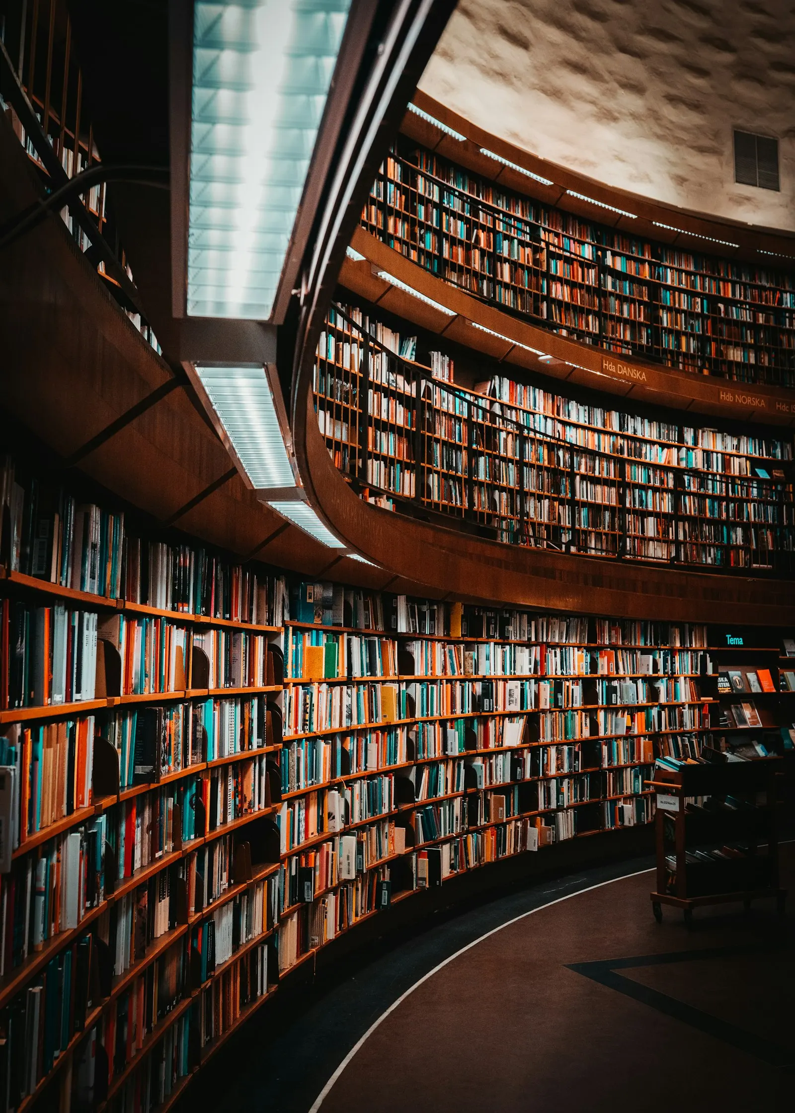 Stacks of legal documents and files representing the major Epstein document releases of 2024 through 2026
