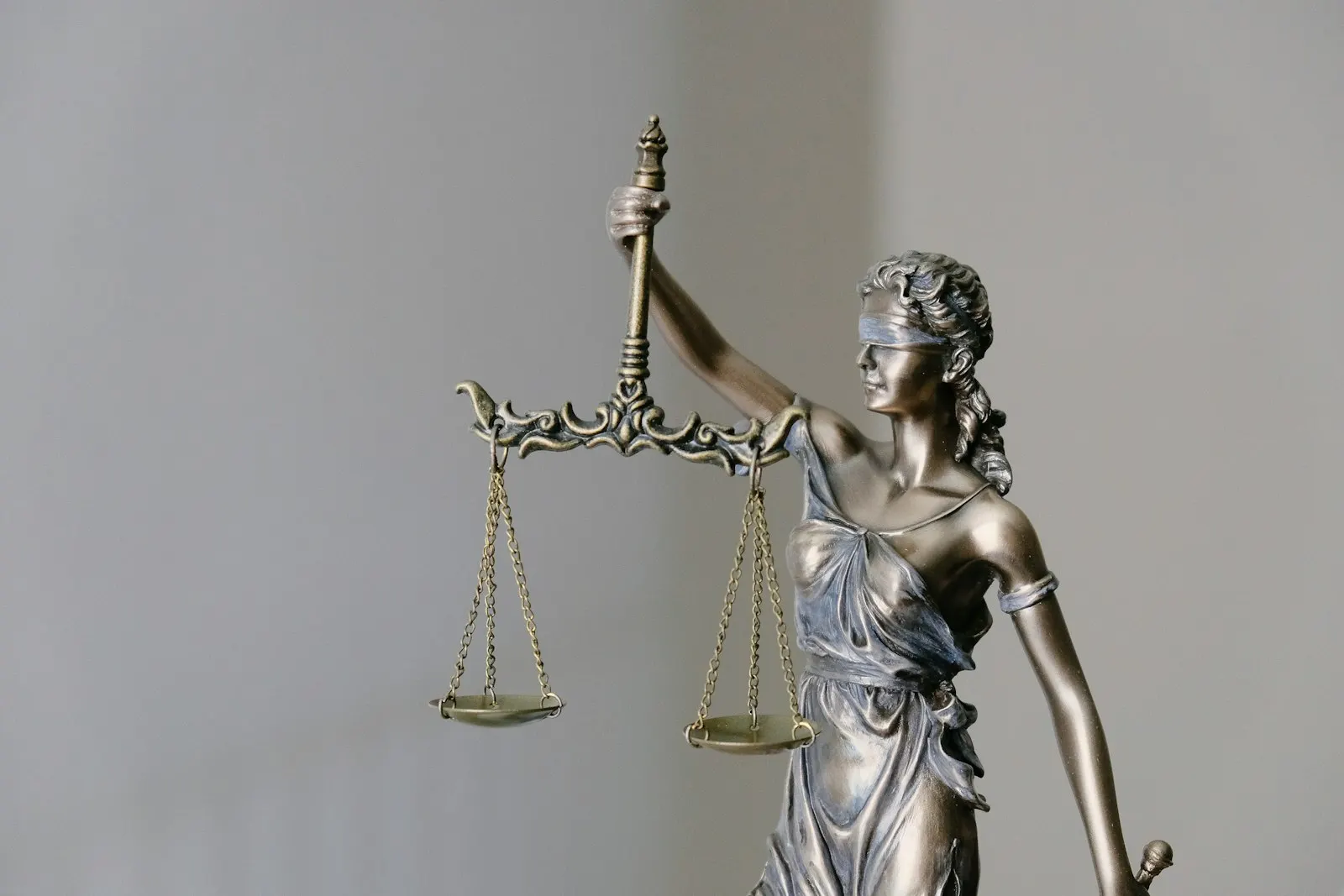 Scales of justice representing victim compensation and legal proceedings in the Epstein case