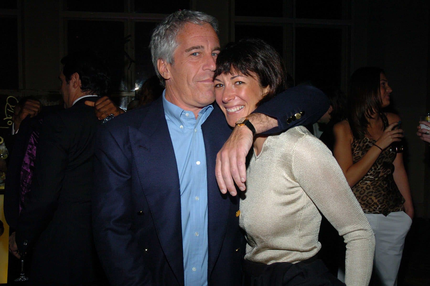 Jeffrey Epstein with Ghislaine Maxwell at a party